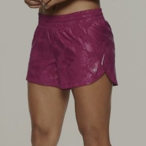 Athleta race run palm print purple shorts